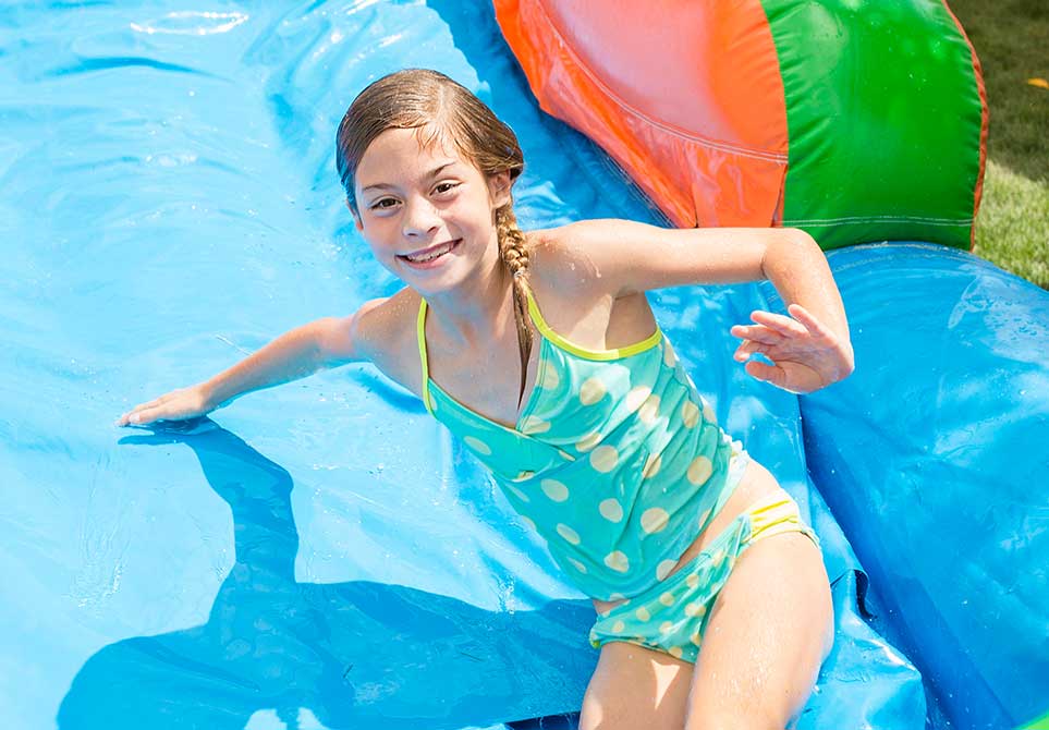 Girl Smiling In Slide